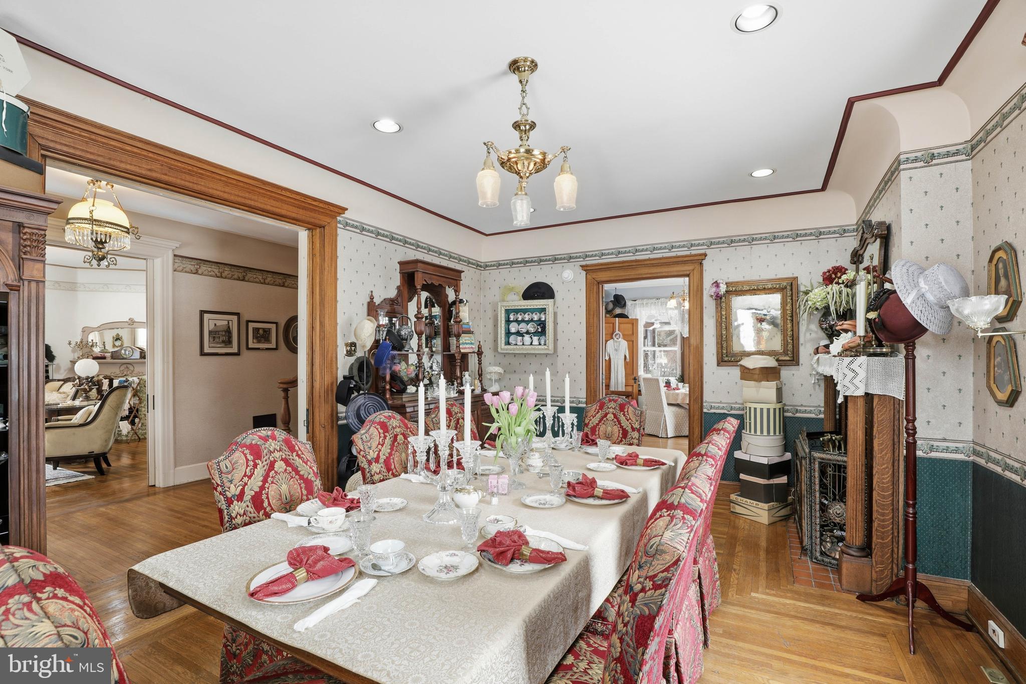 252 Frederick Street Hanover, PA 17331 - Photo 12 of 107 a view of a dining room with furniture a chandelier and wooden floor
