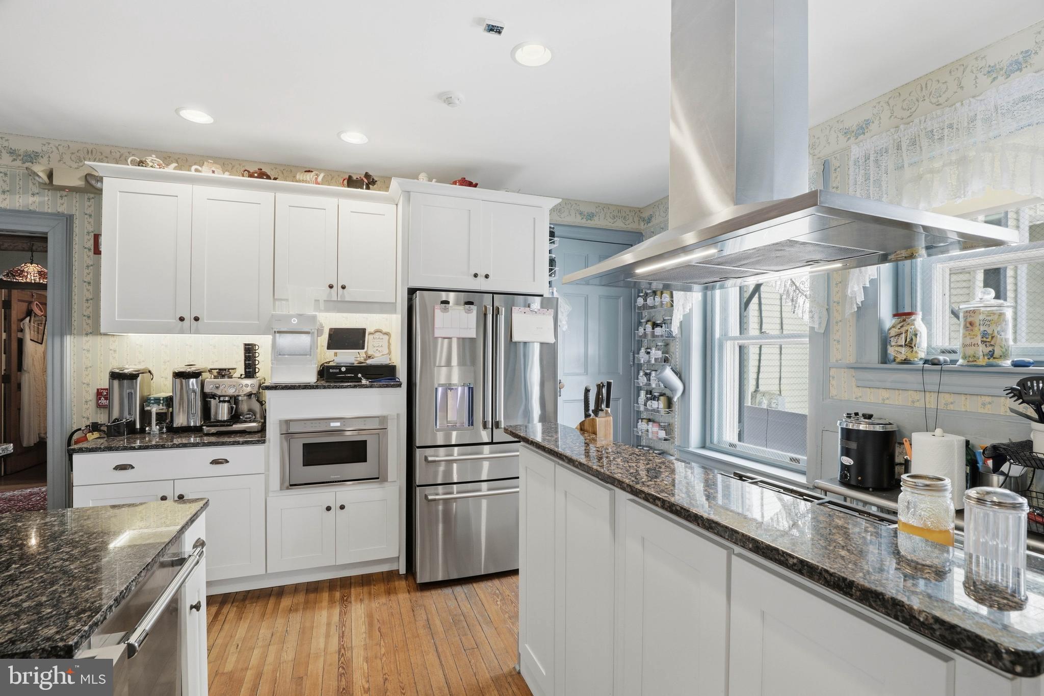 252 Frederick Street Hanover, PA 17331 - Photo 23 of 107 a kitchen with granite countertop a sink appliances cabinets and counter space