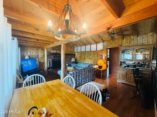 a view of a patio with a table and chairs