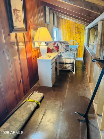 a bed room with a bed and a window