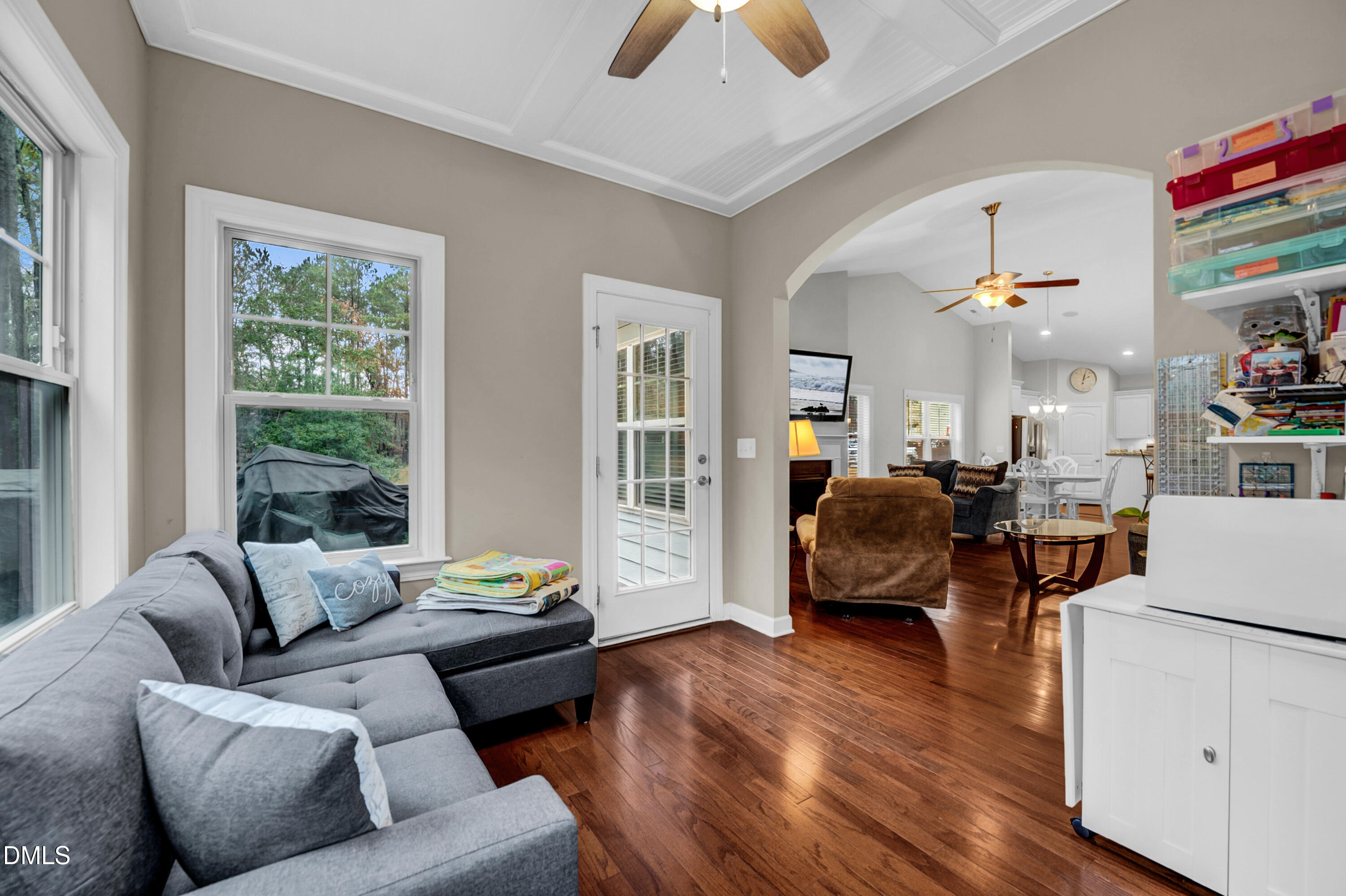 8621 Jordan Meadow Drive Fuquay-Varina, NC 27526 - Photo 15 of 55 a living room with furniture and a large window
