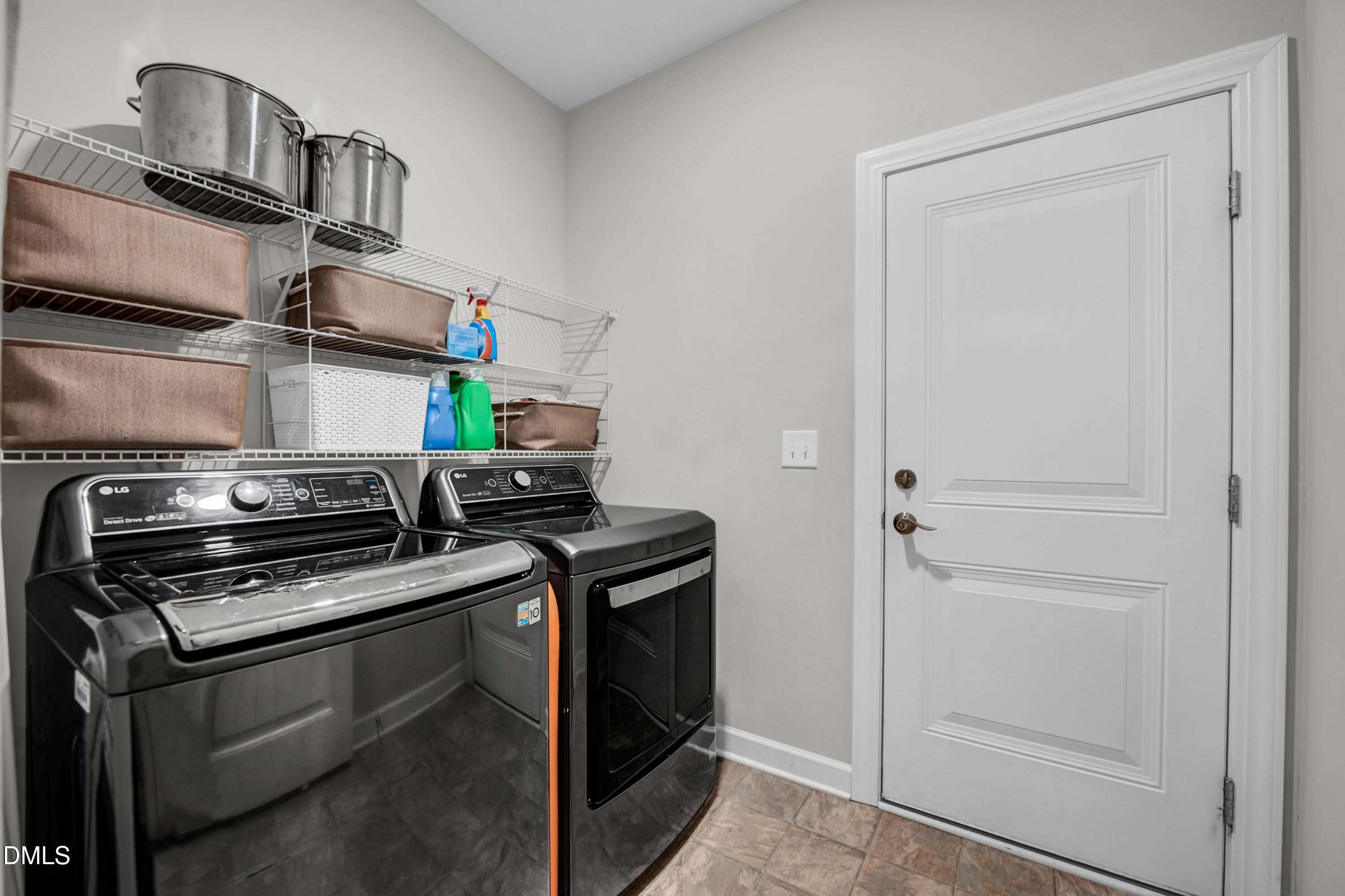 8621 Jordan Meadow Drive Fuquay-Varina, NC 27526 - Photo 17 of 55 a kitchen with a stove and a wooden floor