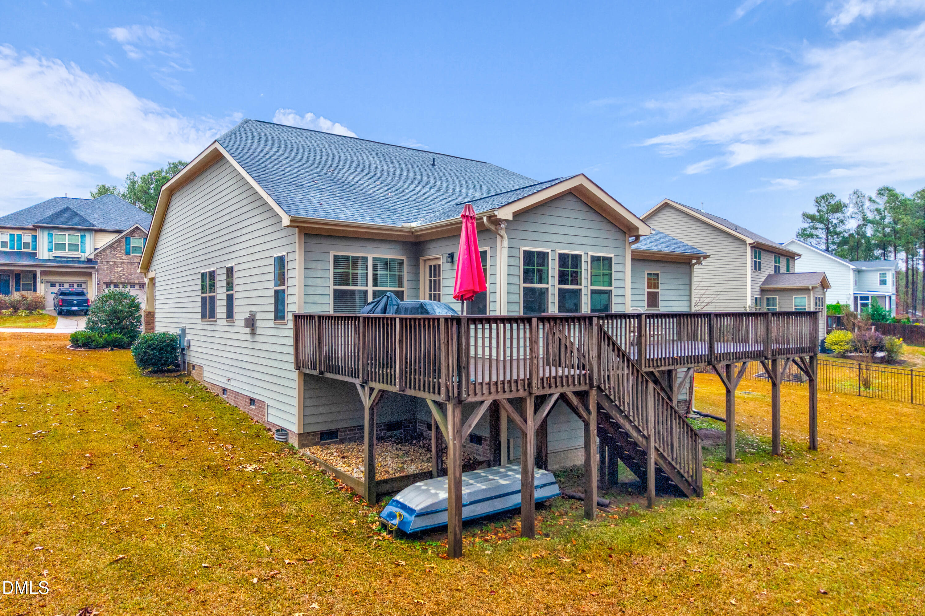 8621 Jordan Meadow Drive Fuquay-Varina, NC 27526 - Photo 34 of 55 a view of a house with pool and chairs