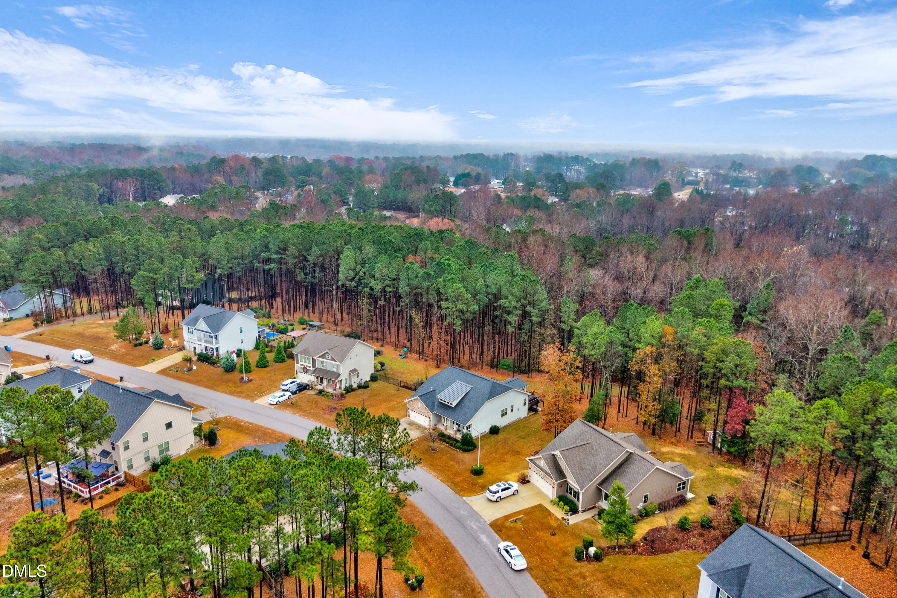 8621 Jordan Meadow Drive Fuquay-Varina, NC 27526 - Photo 43 of 55 an aerial view of a house with a outdoor space