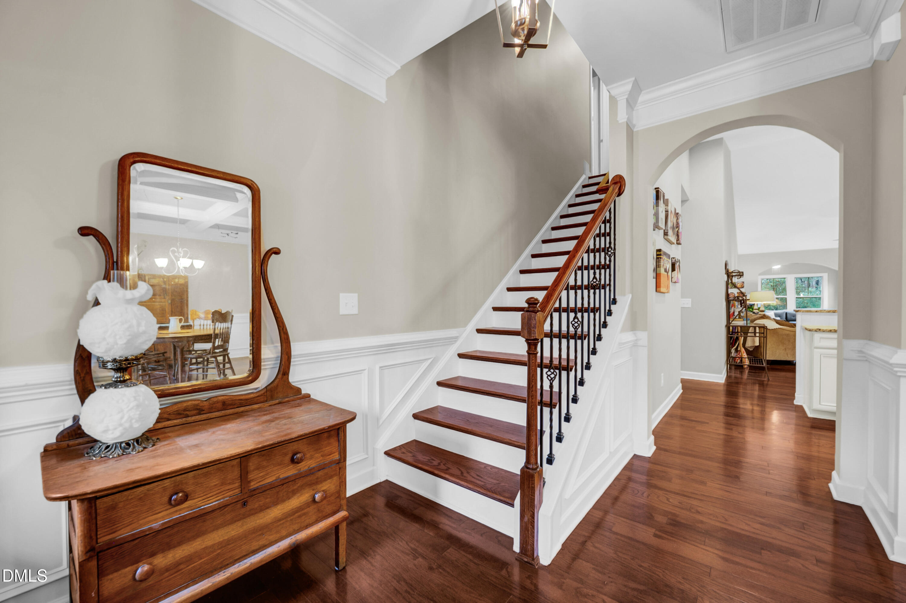 8621 Jordan Meadow Drive Fuquay-Varina, NC 27526 - Photo 4 of 55 a view of entryway and hall with wooden floor