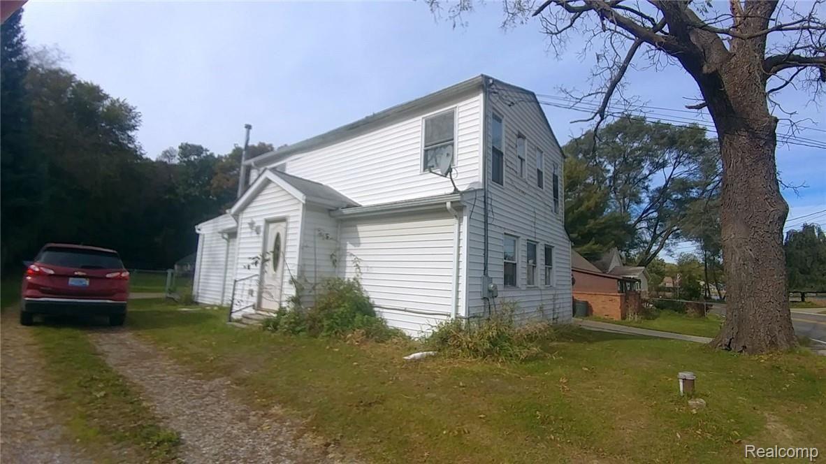 3486 Newton Road Commerce Township, MI 48382 - Photo 5 of 15 left elevation.jpg