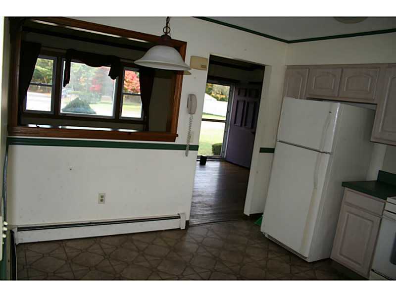 12 Weathervane Way Westerly, RI 02808 - Photo 15 of 20 Kitchen. Kitchen & living room to front door