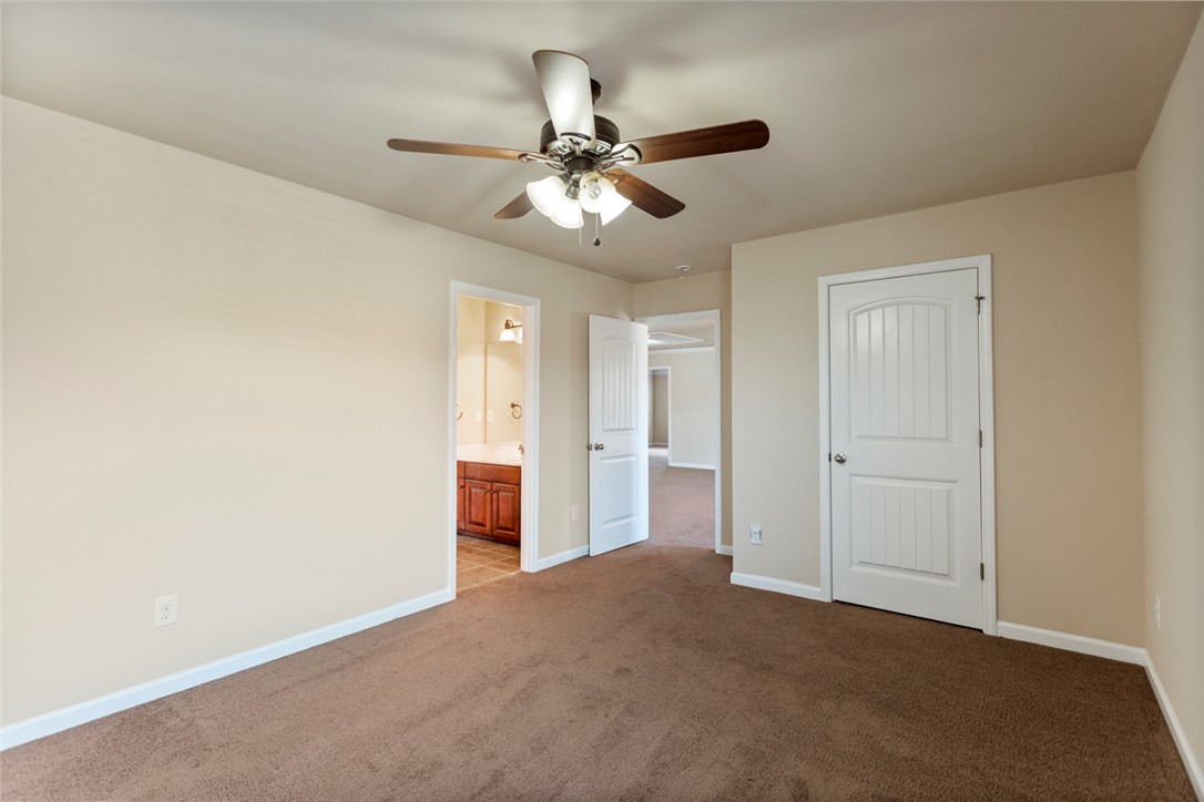 1005 Winmar Drive Anderson, SC 29621 - Photo 38 of 50 This cozy bedroom features plush carpet and an adjacent private bathroom.
