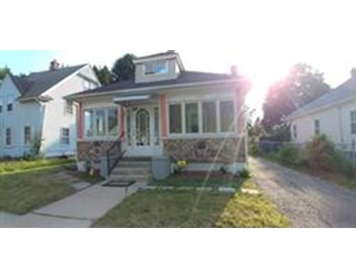 36 Barber Street Springfield, MA 01109 - Photo 2 of 15 a view of a front of house with a yard
