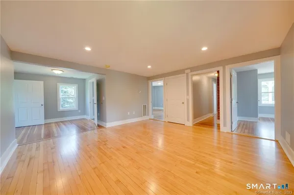 a view of an empty room and window
