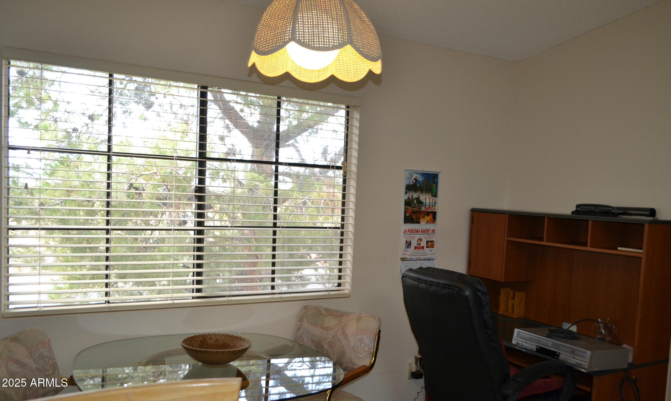 455 South Delaware Drive, Unit 112 Apache Junction, AZ 85120 - Photo 7 of 16 a room with furniture and a window