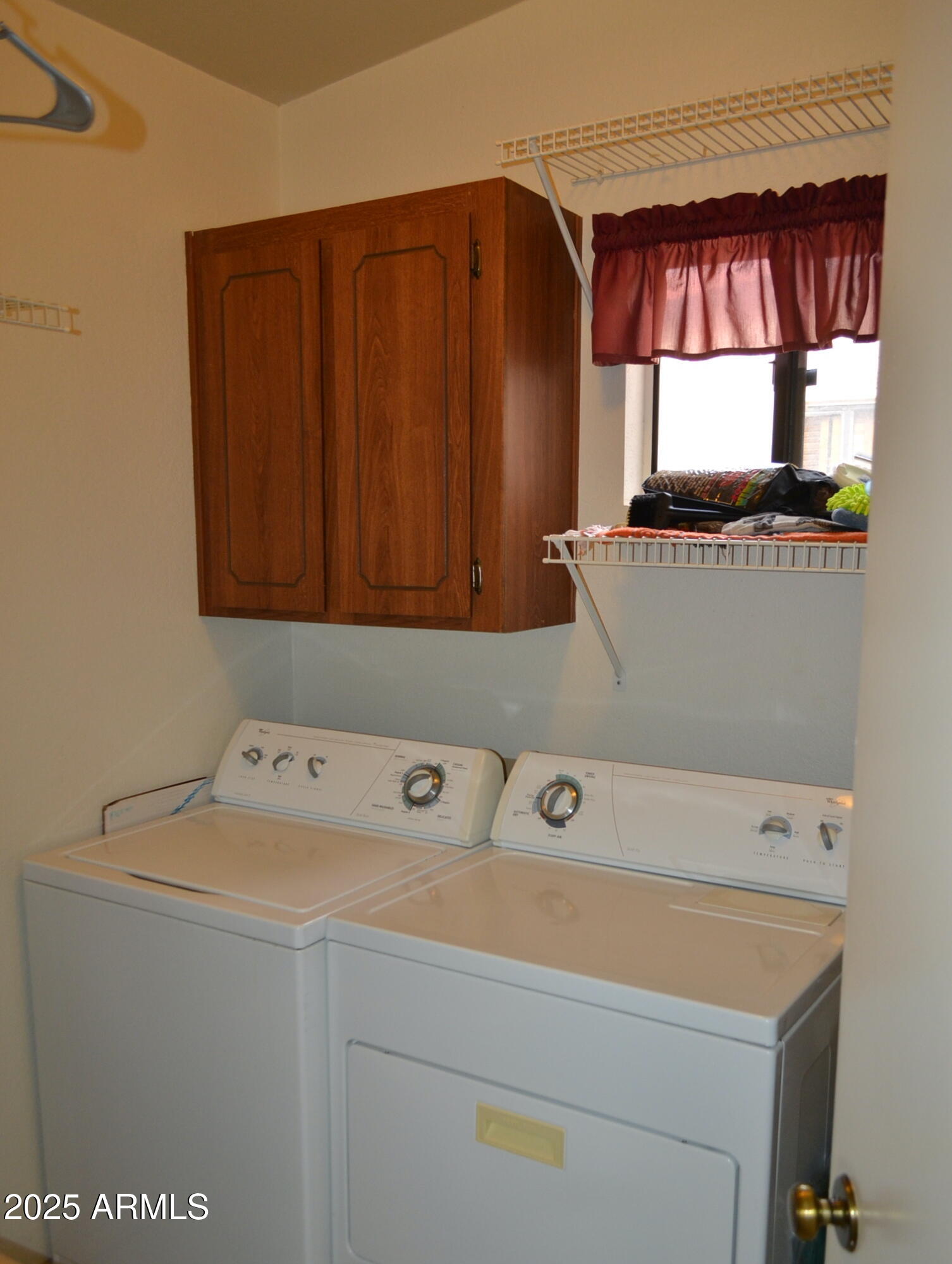 455 South Delaware Drive, Unit 112 Apache Junction, AZ 85120 - Photo 8 of 16 a utility room with dryer and washer