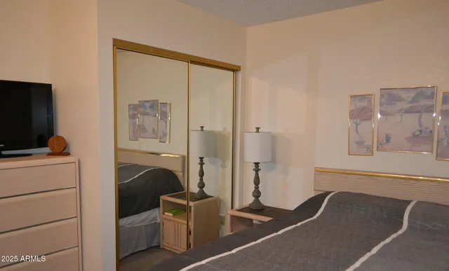 a bathroom with a bathtub and a toilet