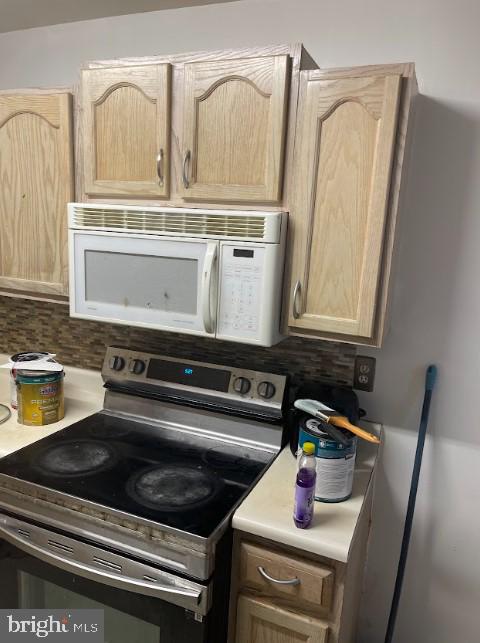 3516 Corn Stream Road Randallstown, MD 21133 - Photo 12 of 66 a stove top oven sitting inside of a kitchen