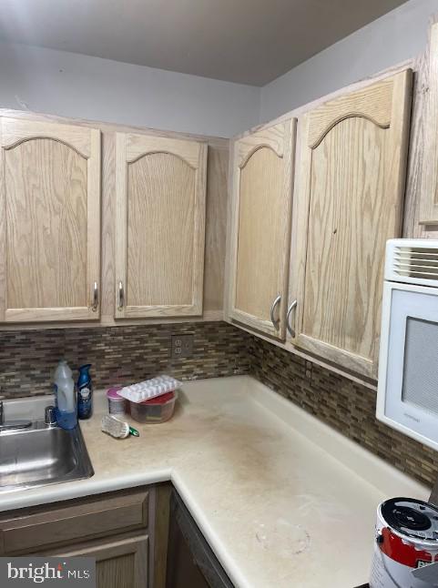 3516 Corn Stream Road Randallstown, MD 21133 - Photo 25 of 66 a bathroom with a sink and a mirror