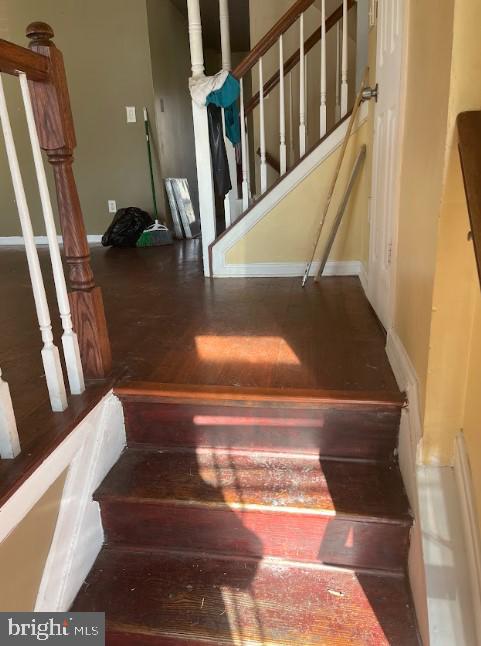 3516 Corn Stream Road Randallstown, MD 21133 - Photo 30 of 66 a view of staircase with lots of frames on wall and a window