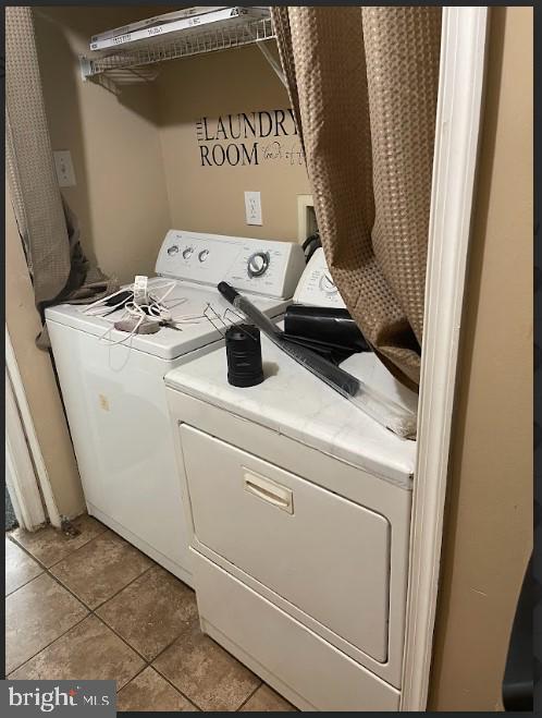 3516 Corn Stream Road Randallstown, MD 21133 - Photo 41 of 66 a utility room with dryer and washer