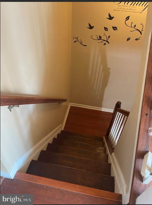 3516 Corn Stream Road Randallstown, MD 21133 - Photo 45 of 66 a view of staircase with wooden floor