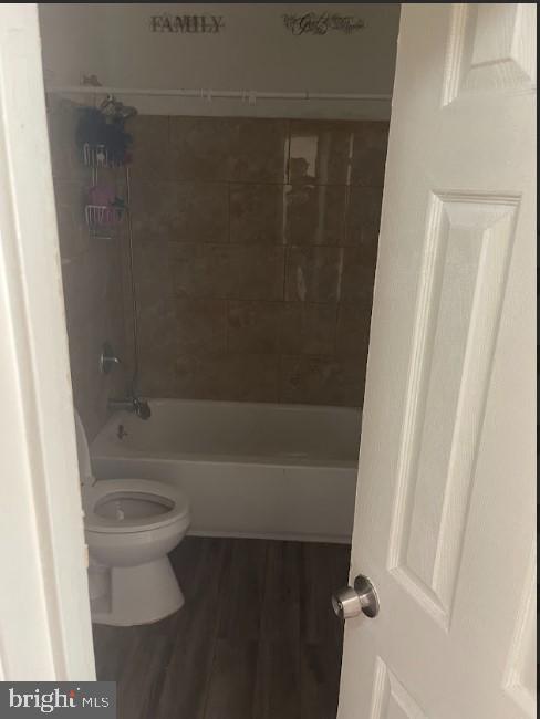 3516 Corn Stream Road Randallstown, MD 21133 - Photo 47 of 66 a bathroom with a bathtub and toilet