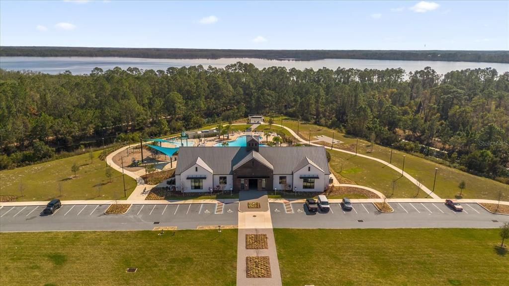 6895 Botanic Boulevard Harmony, FL 34773 - Photo 25 of 31 a view of a swimming pool with a yard