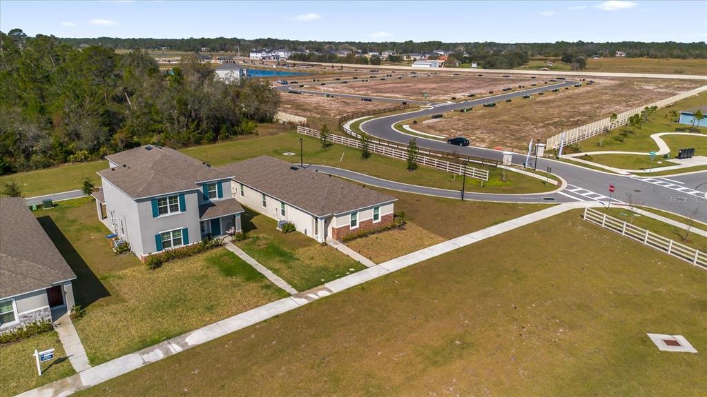 6895 Botanic Boulevard Harmony, FL 34773 - Photo 28 of 31 an aerial view of a house with a ocean view