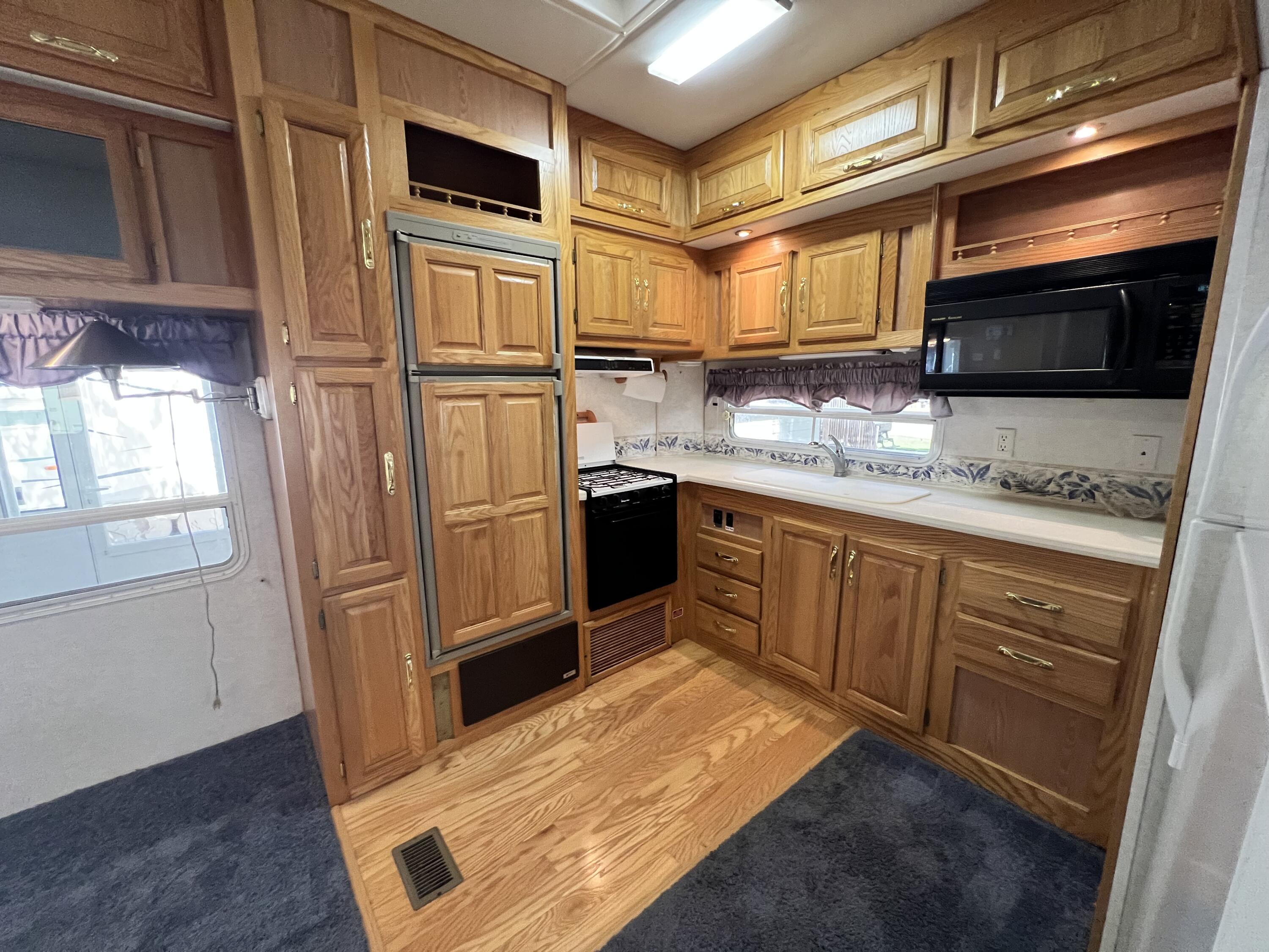 10020 Musson Road, Unit 155 Six Lakes, MI 48886 - Photo 14 of 54 IMG_5045
