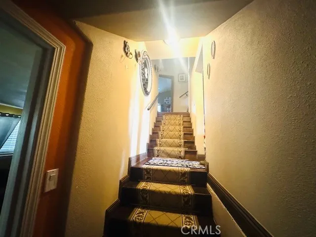 a bedroom with furniture and a bed