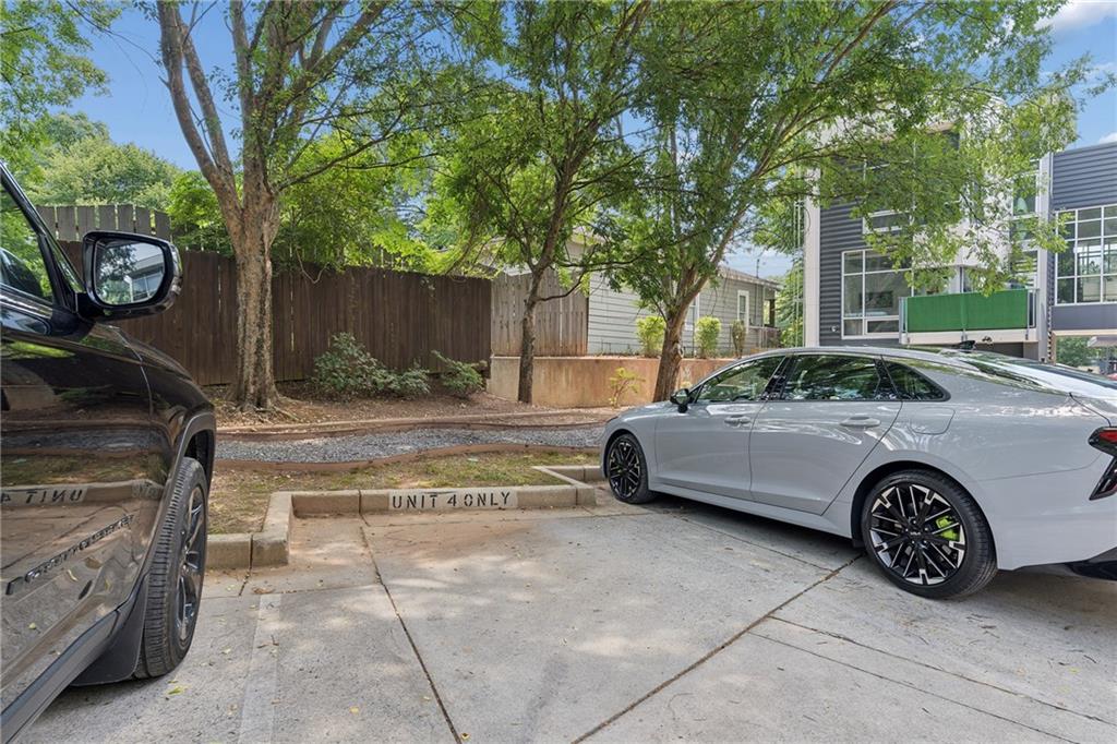 752 Moreland Avenue Southeast, Unit 4 Atlanta, GA 30316 - Photo 46 of 58 a view of a car parked in front of a house