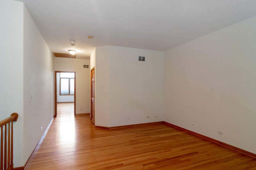 922 West Chesterfield Court Palatine, IL 60067 - Photo 17 of 19 a view of a room with wooden floor