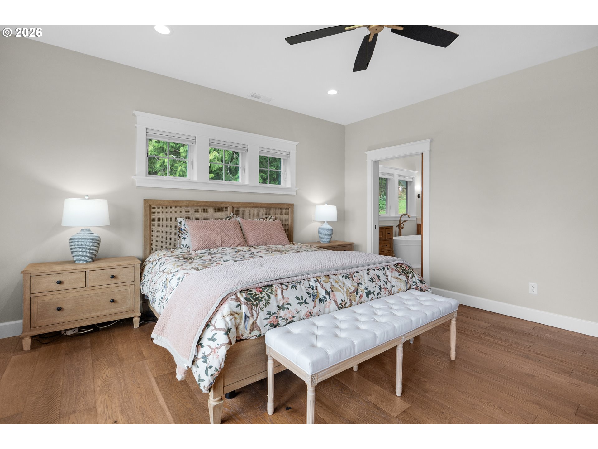 38590 Meadow Loop Nehalem, OR 97131 - Photo 28 of 48 a bedroom with a bed and a chandelier
