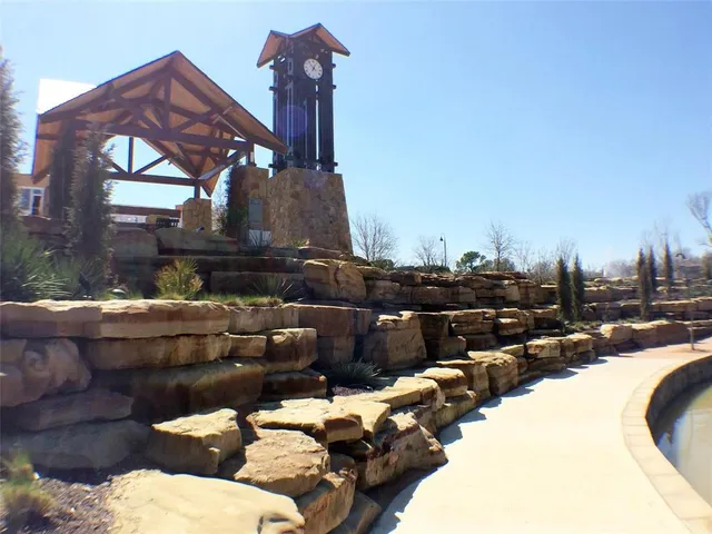 a view of a house with a bed and a couch