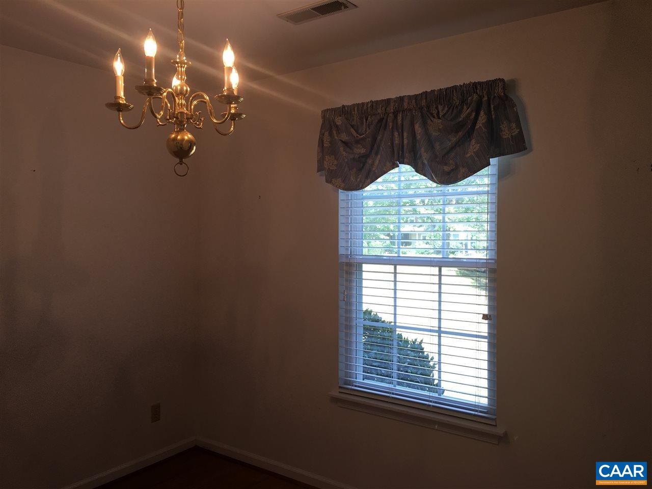 1650 Cool Spring Road Charlottesville, VA 22901 - Photo 4 of 24 a bathroom with a window and a chandelier