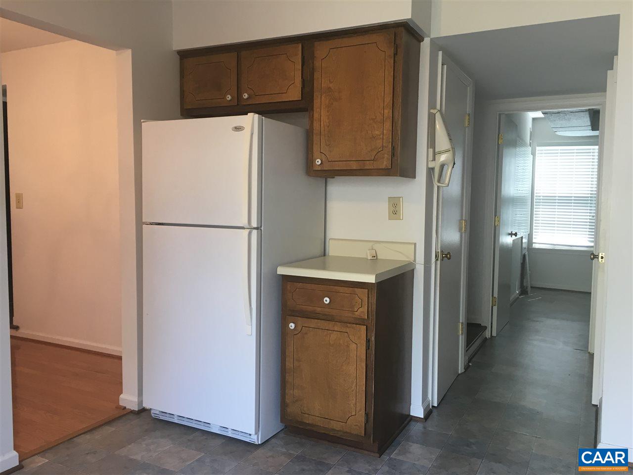 1650 Cool Spring Road Charlottesville, VA 22901 - Photo 6 of 24 a white refrigerator freezer and a stove sitting inside of a refrigerator