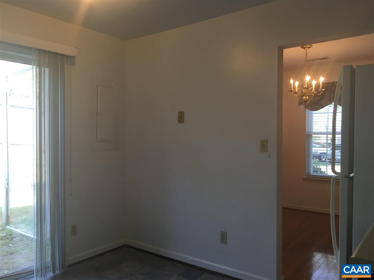 1650 Cool Spring Road Charlottesville, VA 22901 - Photo 7 of 24 an empty room with windows and chandelier