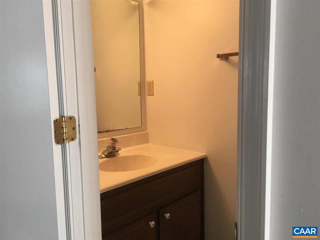 1650 Cool Spring Road Charlottesville, VA 22901 - Photo 9 of 24 a bathroom with a sink and a mirror