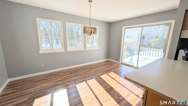 a view of an empty room and window