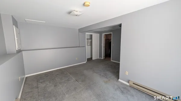 a view of a room with an empty space