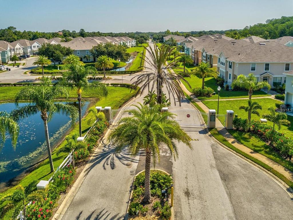 5310 Anhinga Trail New Port Richey, FL 34653 - Photo 27 of 27 an aerial view of a house with a garden and swimming pool