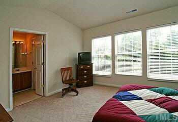 8207 Candelaria Drive Raleigh, NC 27616 - Photo 6 of 8 Plenty of light in this generous master bedroom. Other