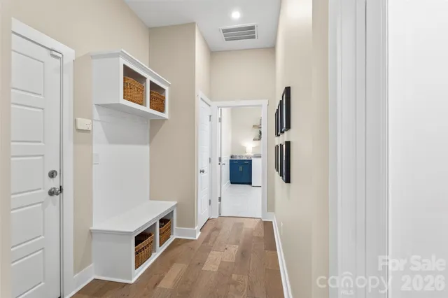 a view of a kitchen from the hallway