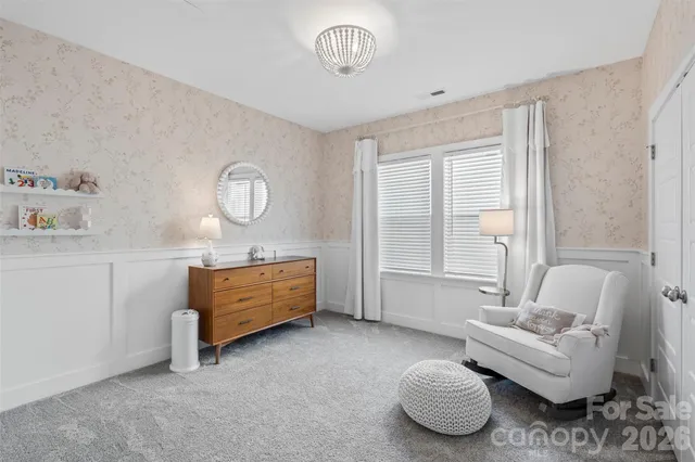 a room with furniture and a window