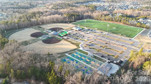 a backyard with table and chairs