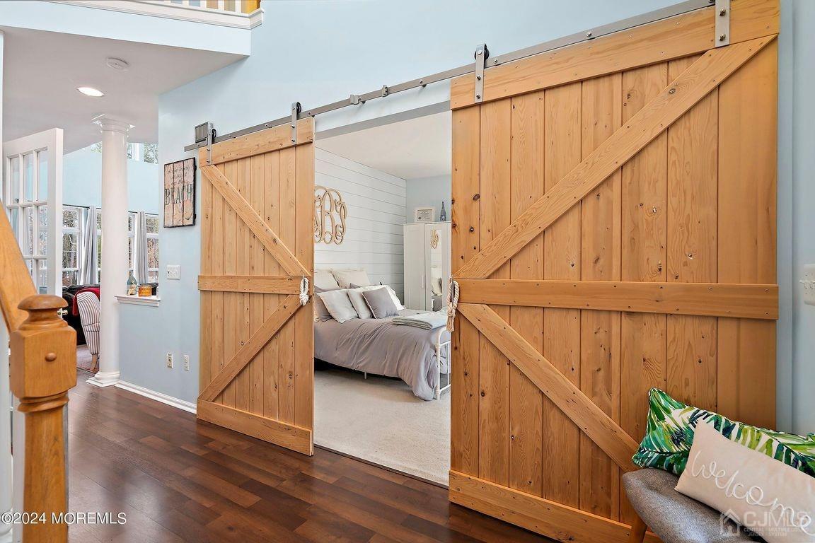 8 Williams Street Barnegat, NJ 08005 - Photo 11 of 64 a room with wooden floor and furniture