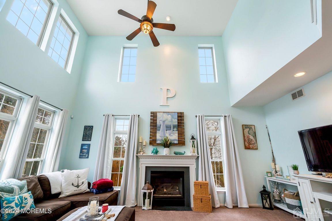8 Williams Street Barnegat, NJ 08005 - Photo 14 of 64 a living room with furniture and a fireplace