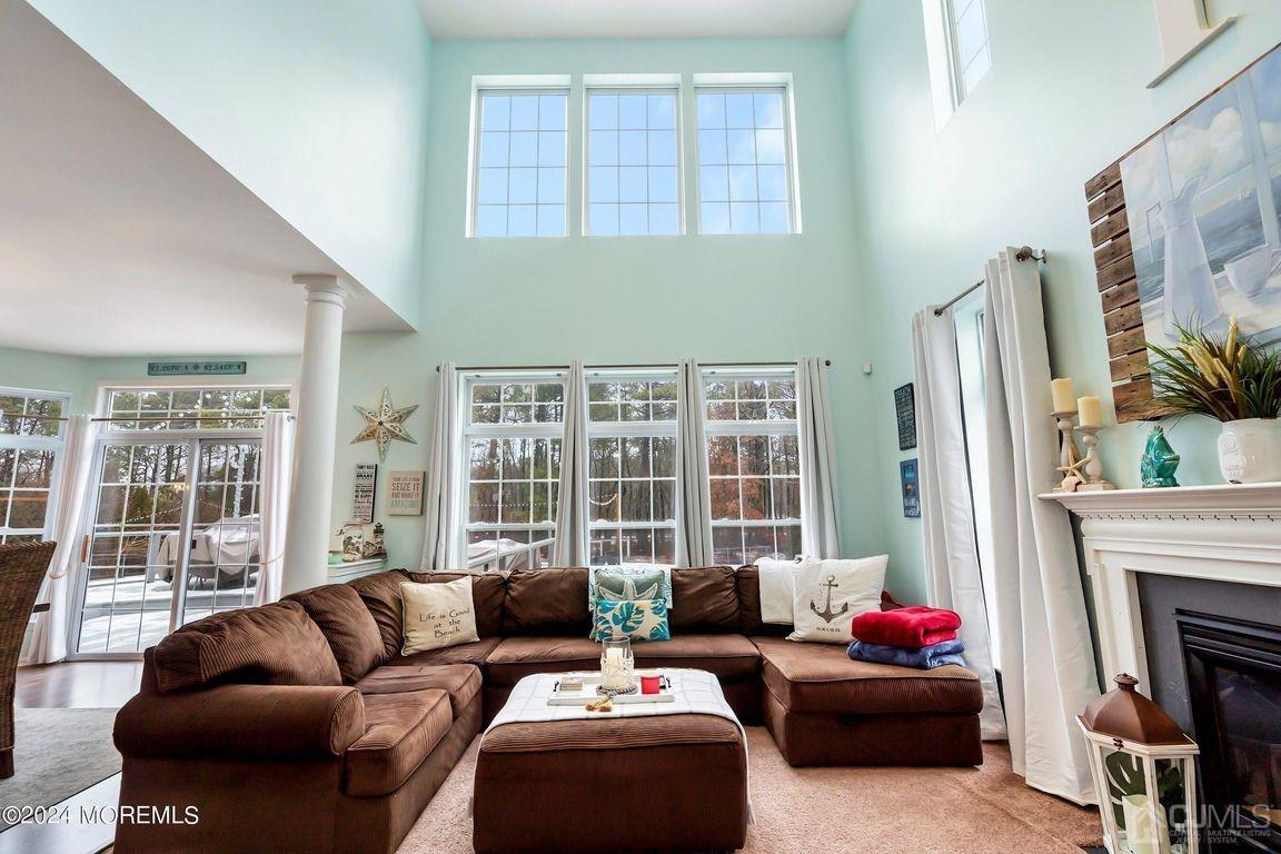 8 Williams Street Barnegat, NJ 08005 - Photo 16 of 64 a living room with furniture and a fireplace