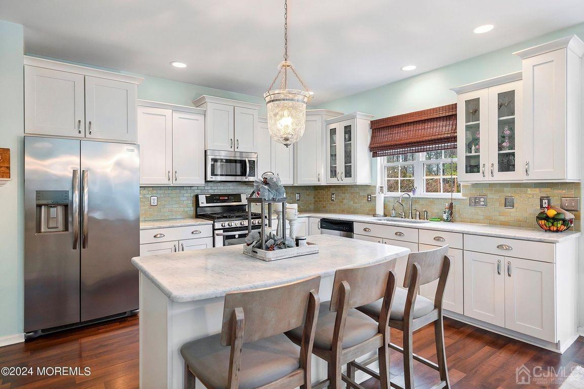 8 Williams Street Barnegat, NJ 08005 - Photo 24 of 64 a kitchen with granite countertop a center island and stainless steel appliances