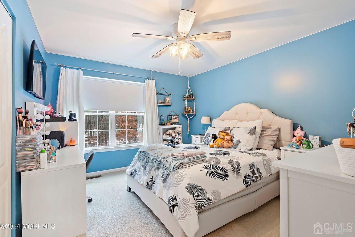 8 Williams Street Barnegat, NJ 08005 - Photo 35 of 64 a bedroom with a bed and a large window with the outer view