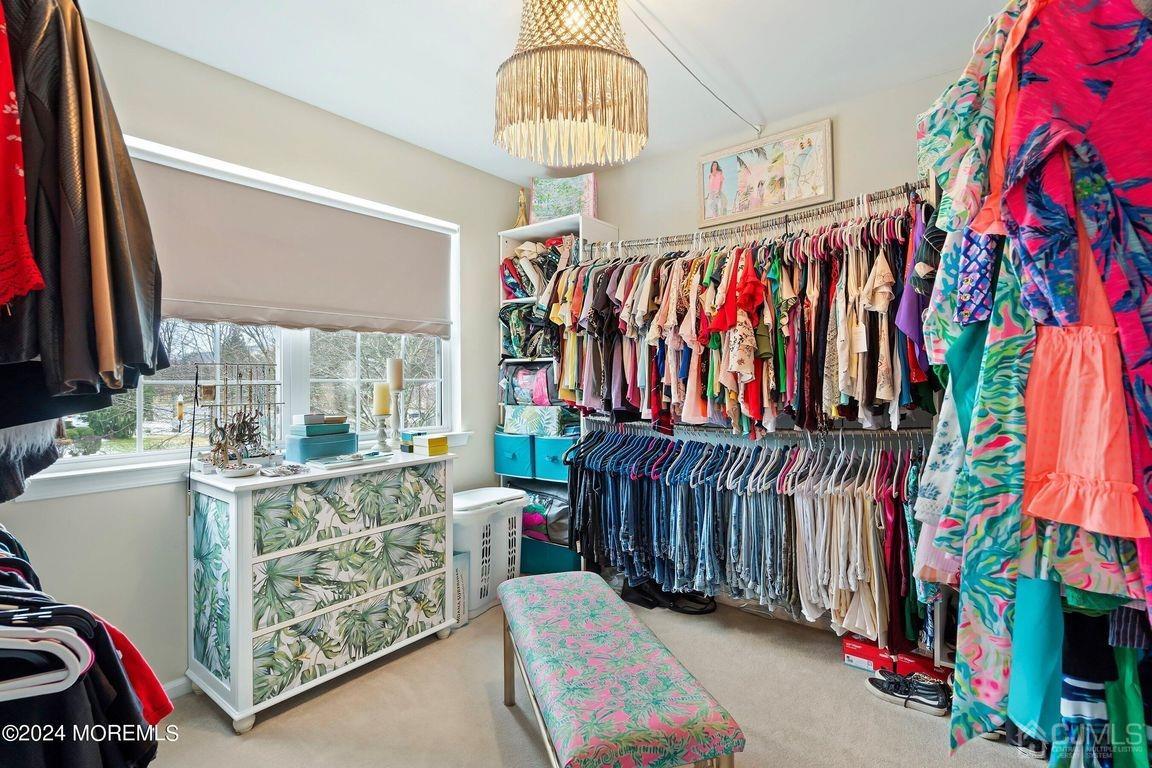 8 Williams Street Barnegat, NJ 08005 - Photo 39 of 64 a view of walk in closet with clothes