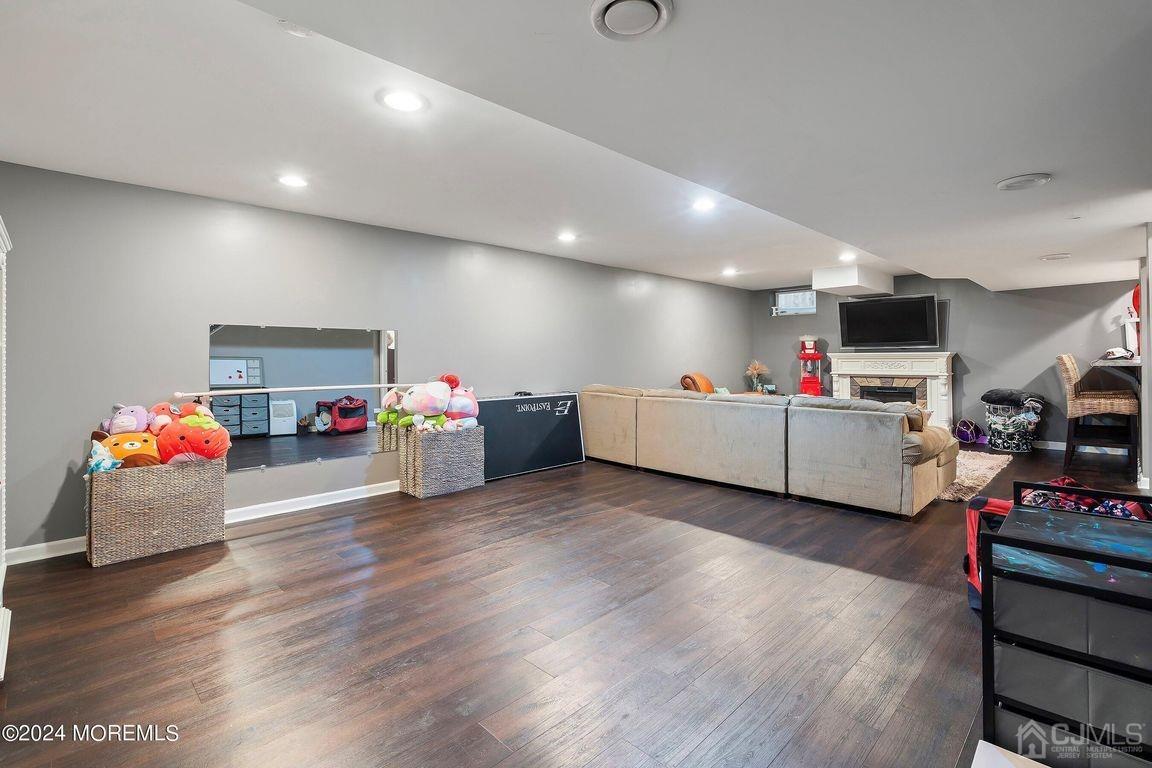 8 Williams Street Barnegat, NJ 08005 - Photo 43 of 64 a room with furniture and gym equipment