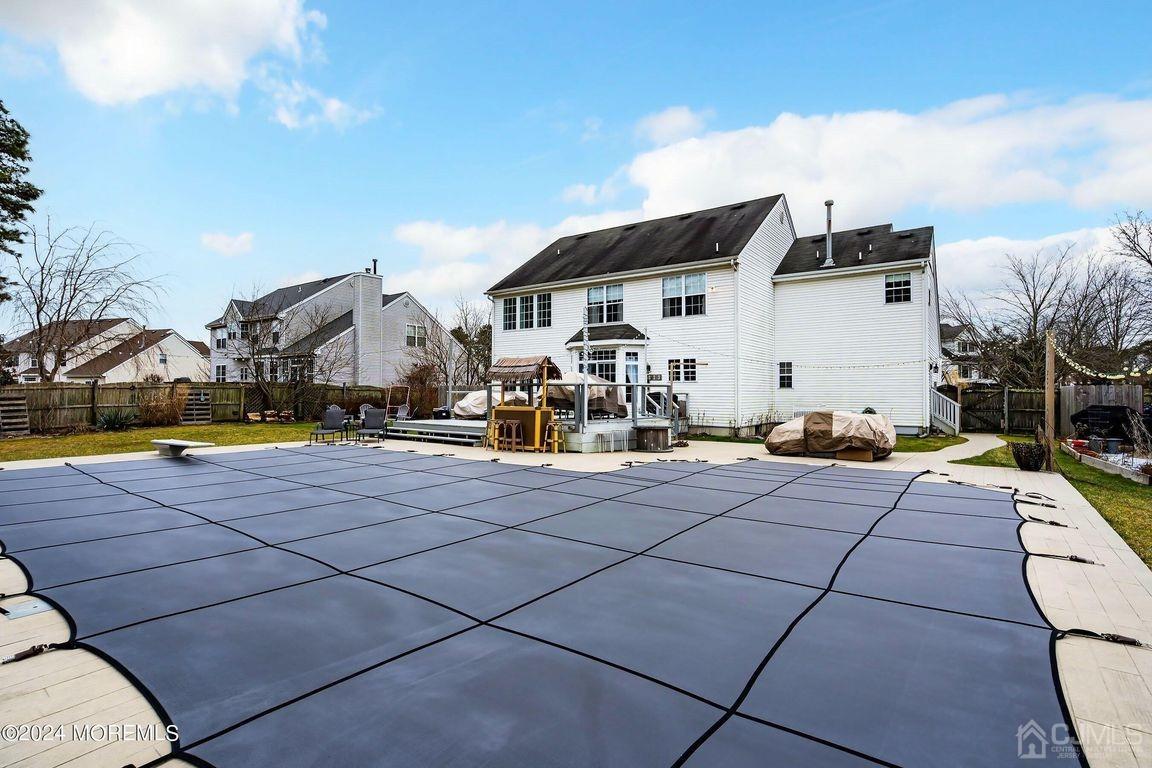 8 Williams Street Barnegat, NJ 08005 - Photo 53 of 64 a view of a white house with swimming pool in front of it